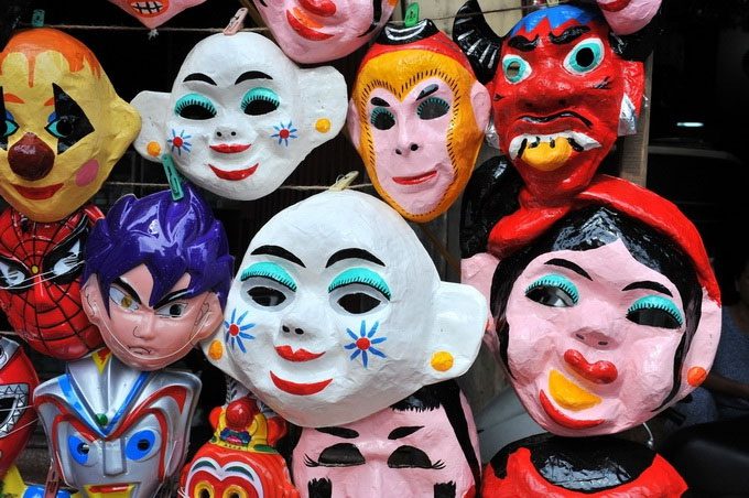 The traditional paper mache masks of that time were thick, durable, and full of character.