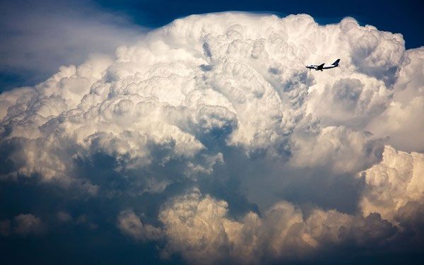 What happens to an aircraft when it "encounters" a storm in the sky?