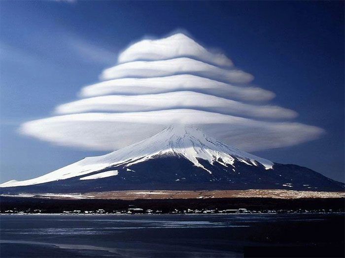 Lenticular cloud phenomenon appearing at Mount Fuji, Japan.