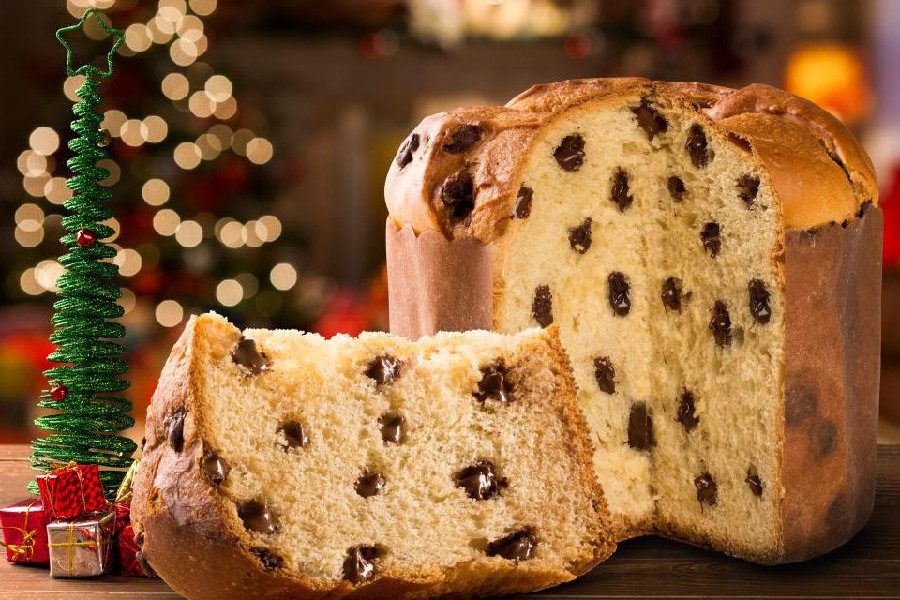 The sweet bread typical of Italy is Panettone, which shares similarities with the German Stollen in having raisins and fruit preserves.