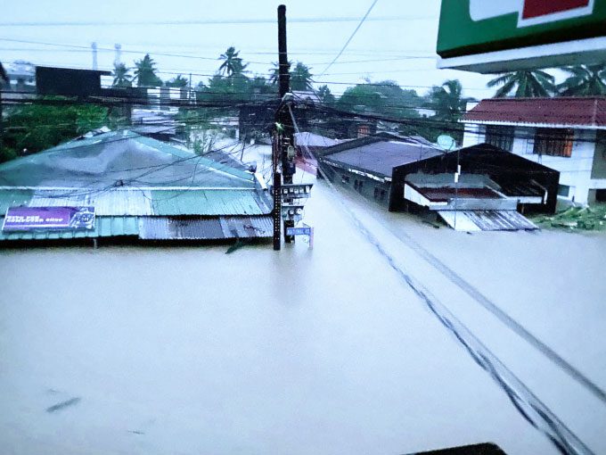 Homes nearly submerged in Bato, Camarines Sur province on October 23.