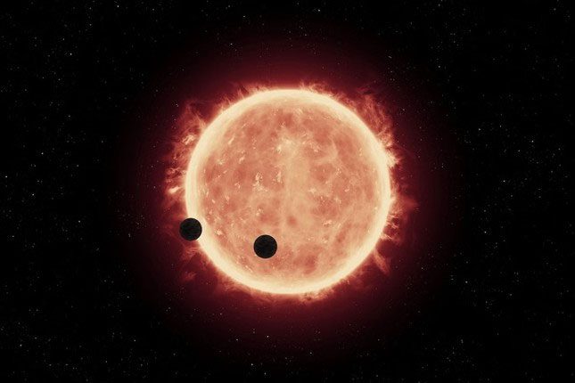 Two exoplanets of Trappist-1 passing in front of their star.