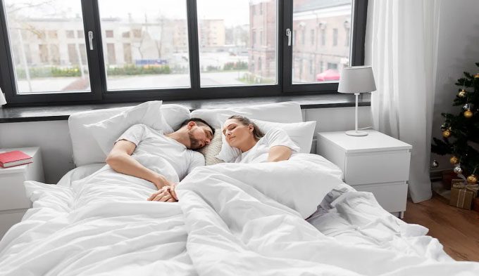 Sleeping with separate blankets can help individuals sleep better.