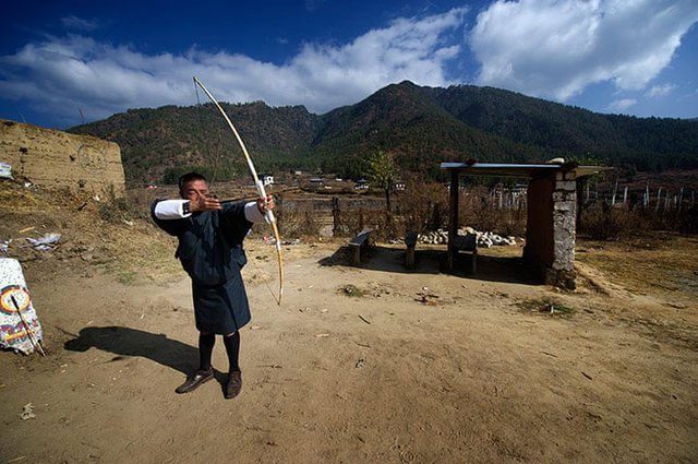 A farmer practicing archery in Paro, Bhutan.