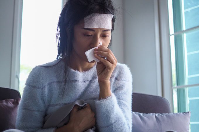 Illustration of a person with the flu