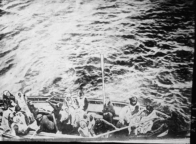 Survivors from the wreck of the Titanic preparing to board the RMS Carpathia.