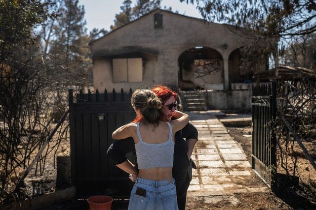 A house destroyed in a wildfire in Chalandri, a suburb of Athens.