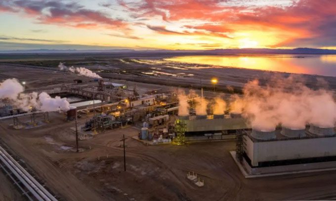 Steam rising from an industrial geothermal power plant in Southern California, USA.