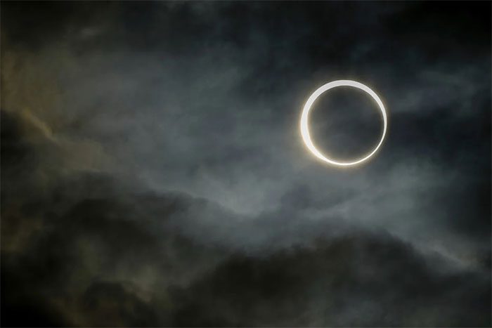 The moon moving across the sun during an annular solar eclipse in Puerto San Julian, Argentina