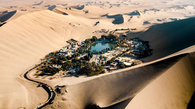 The oasis town of Huacachina hidden beneath the Atacama Desert