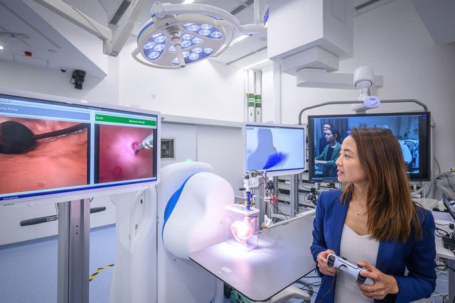 Dr. Shannon Chan using a game controller to operate an endoscope.