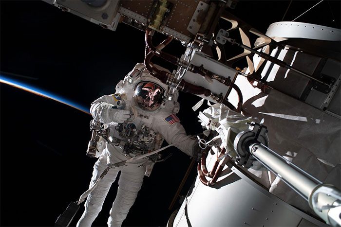 Astronaut walking in space.