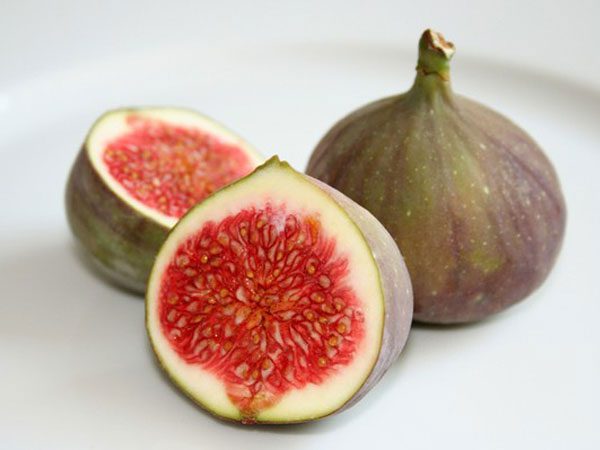 Eating too many figs can cause bloating and stomach pain.