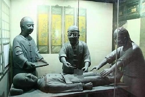 Stone statue depicting the castration process, also known as the removal of male genitalia in China.