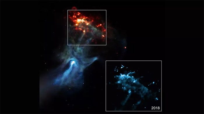 Image of the ghostly hand reaching out into the vastness of space.