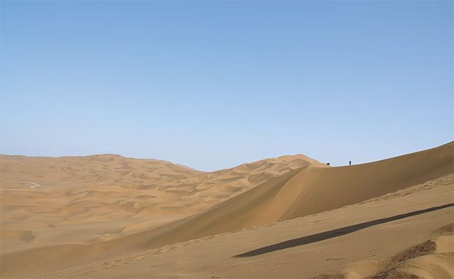 The Taklimakan Desert has almost no water, and any that exists evaporates immediately.