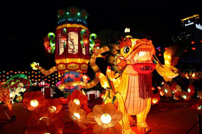 During the Mid-Autumn Festival, Chinese people typically perform dragon dances, while Vietnamese people perform lion or unicorn dances.