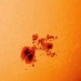 the sun appears with many unusual black spots causing astronomers to be surprised 136418