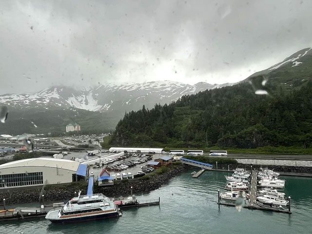 The town's deep-water port, surrounded by majestic mountain ranges