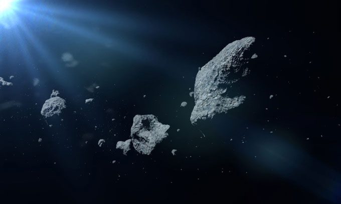 Illustration of asteroids flying in space.