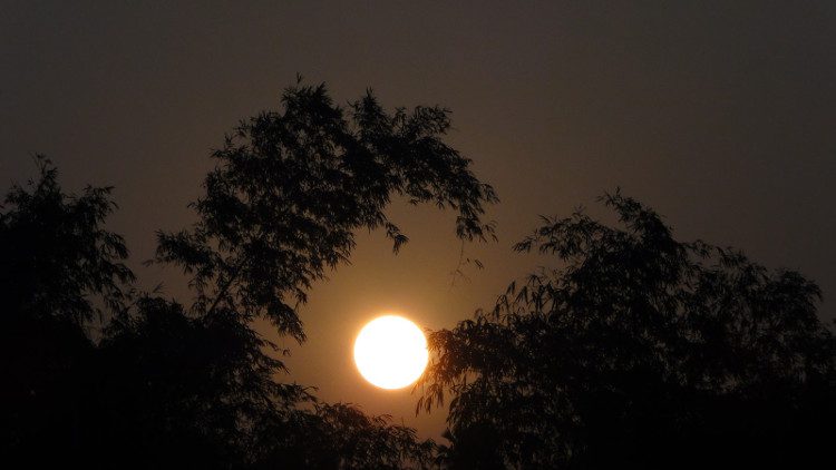 The Mid-Autumn Moon appears redder due to light passing through the atmosphere.