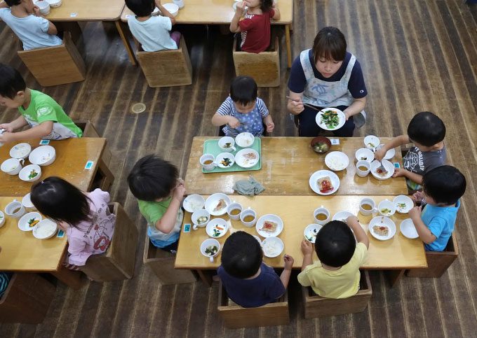 Children having lunch at a kindergarten in Yokohama, Japan.