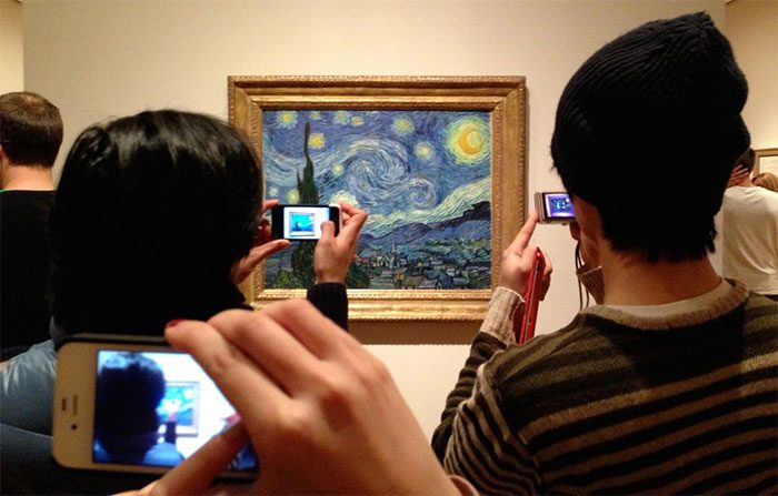 It is difficult to appreciate a painting when people are constantly taking photos in front of it.