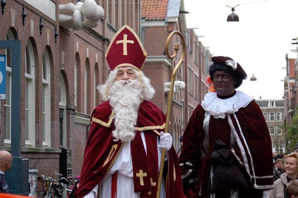 In the Netherlands, Black Pete (Zwarte Piet) climbs down the chimney to fill wooden shoes with candy and toys for well-behaved children.