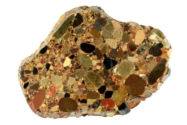 Sedimentary conglomerate formed through the deposition, binding, and compression of pebbles.