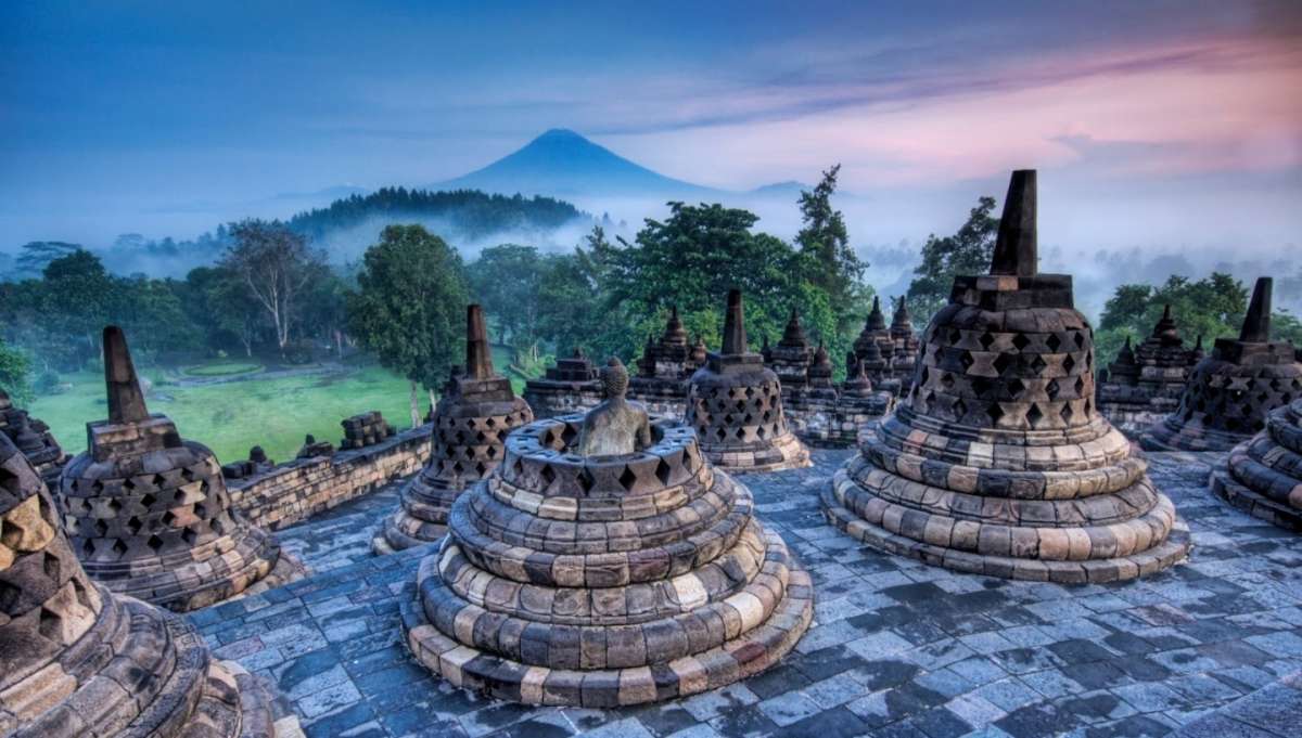 On the first circle, there are 36 stupas, while the second circle has 24 stupas. These stupas are known as Parinirwana and have diamond-shaped holes surrounding them.