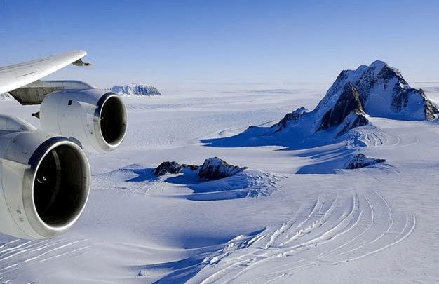 If flying across the Pacific, the distance will be longer than flying around the Arctic.