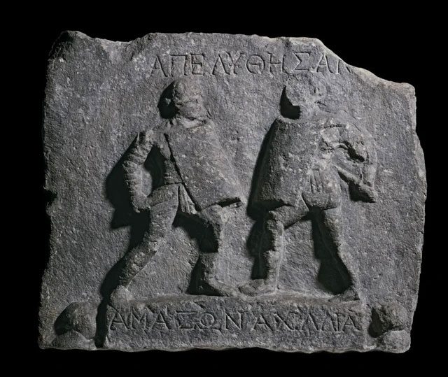 A marble relief in the British Museum depicting two female gladiators without helmets.