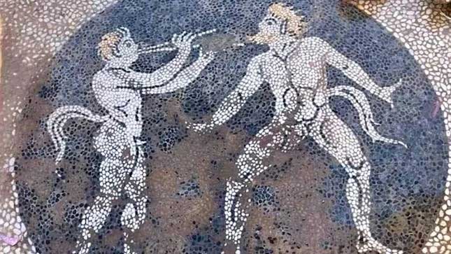 The mosaic depicts two hybrid souls between humans and animals representing Dionysus