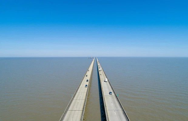 The bridge is so long that drivers cannot see land