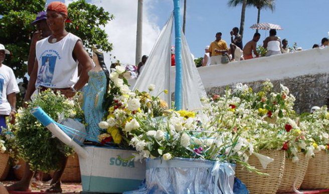 Brazilians traditionally throw white flowers into the waves to honor the sea goddess Yemanja.