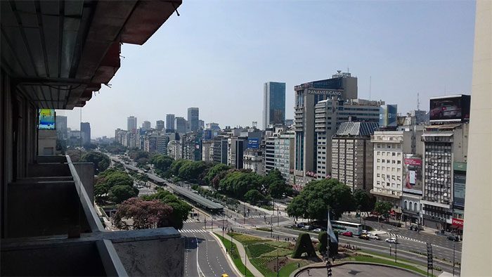 Neatly constructed buildings on both sides of the avenue