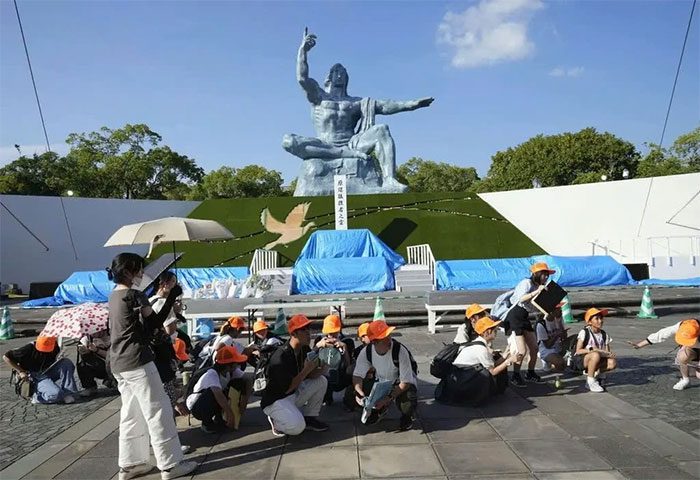 Tourists at the Peace Park in Nagasaki, Western Japan