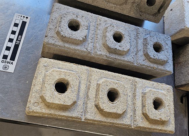 LayGo Blocks interlock without mortar and have holes for rebar placement.