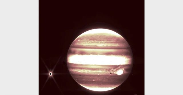 Image of Jupiter and its moon Europa captured by the 2.12-micron filter of NIRCam