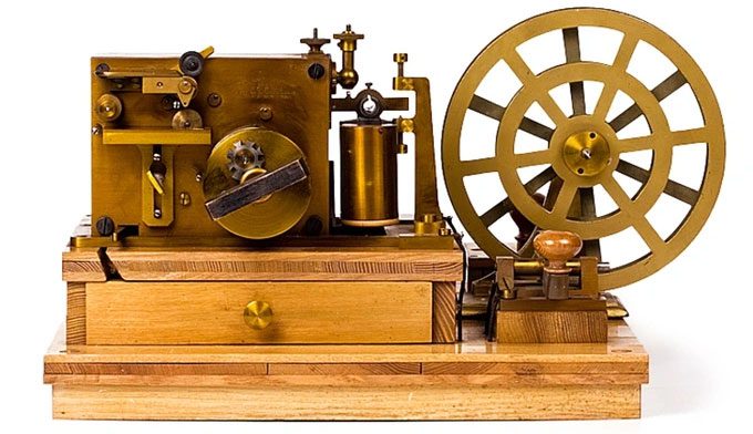 A telegraph machine using Morse code for communication.