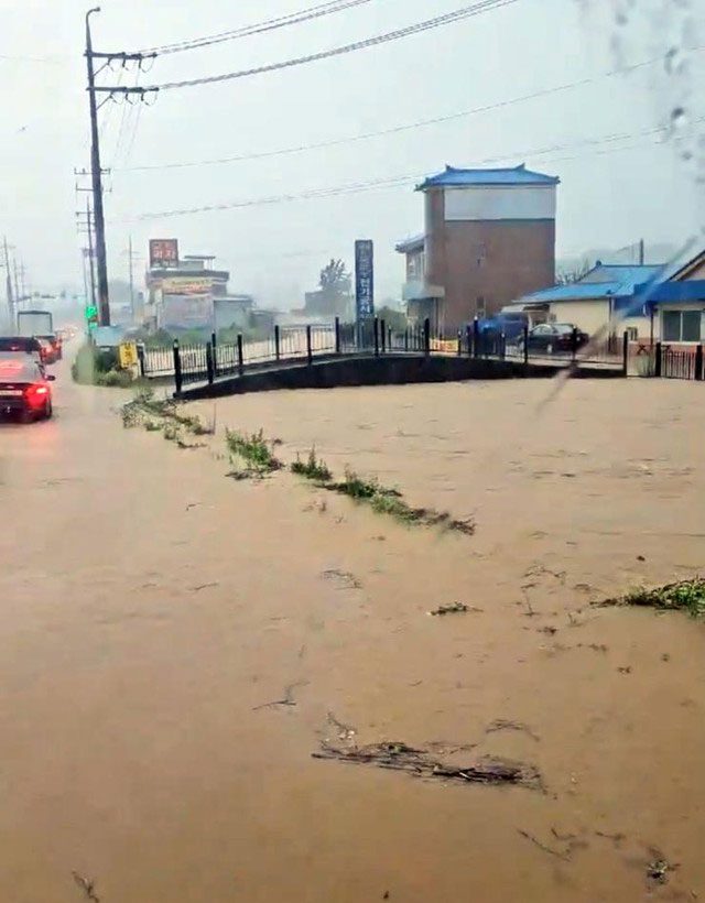 A river overflowed, causing flooding in Gyeonggi Province