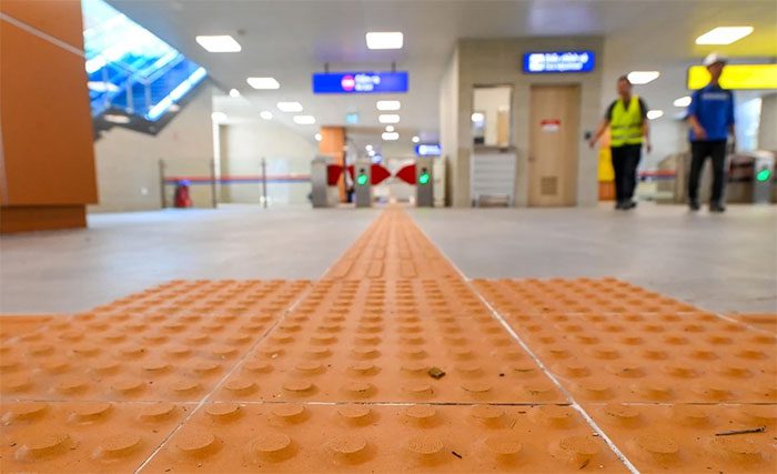 The station has a designated walkway for the visually impaired.