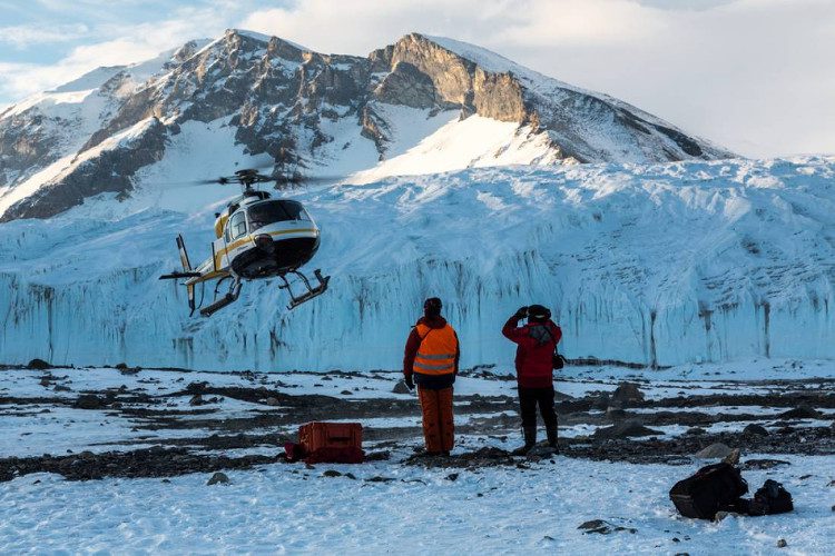 Scientists traveled by helicopter to McMurdo.