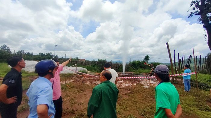 Unusual phenomenon from the well, gas and water spurting high into the air.