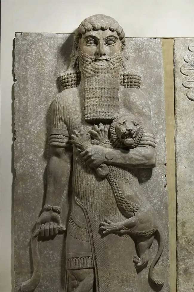 Relief depicting Gilgamesh, displayed at the Louvre Museum.