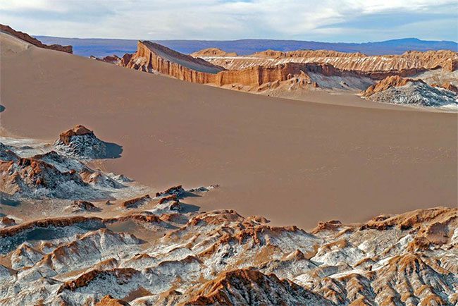 The arid environment of the Atacama Desert will persist for another 10-15 million years.