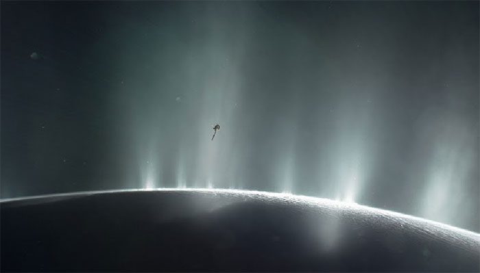 The Cassini spacecraft flying close to the surface of the "moon of life" Enceladus