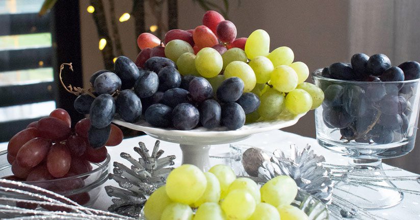 Spaniards eat 12 grapes as the clock strikes midnight.