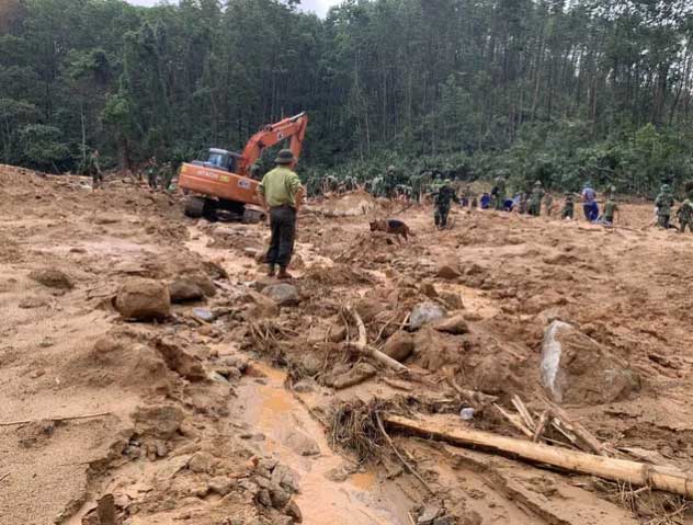 Rescue forces searching for missing persons in a landslide incident