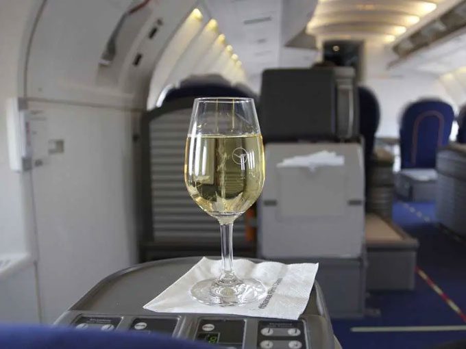 Some airlines serve alcoholic beverages during flights